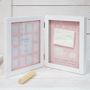 You added Baby's First 12 Months Footprint Imprint Frame - Pink to your cart.